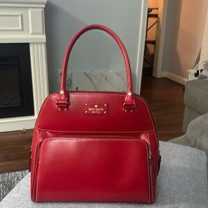 True red Kate Spade small Maeda bag.  Great bag.